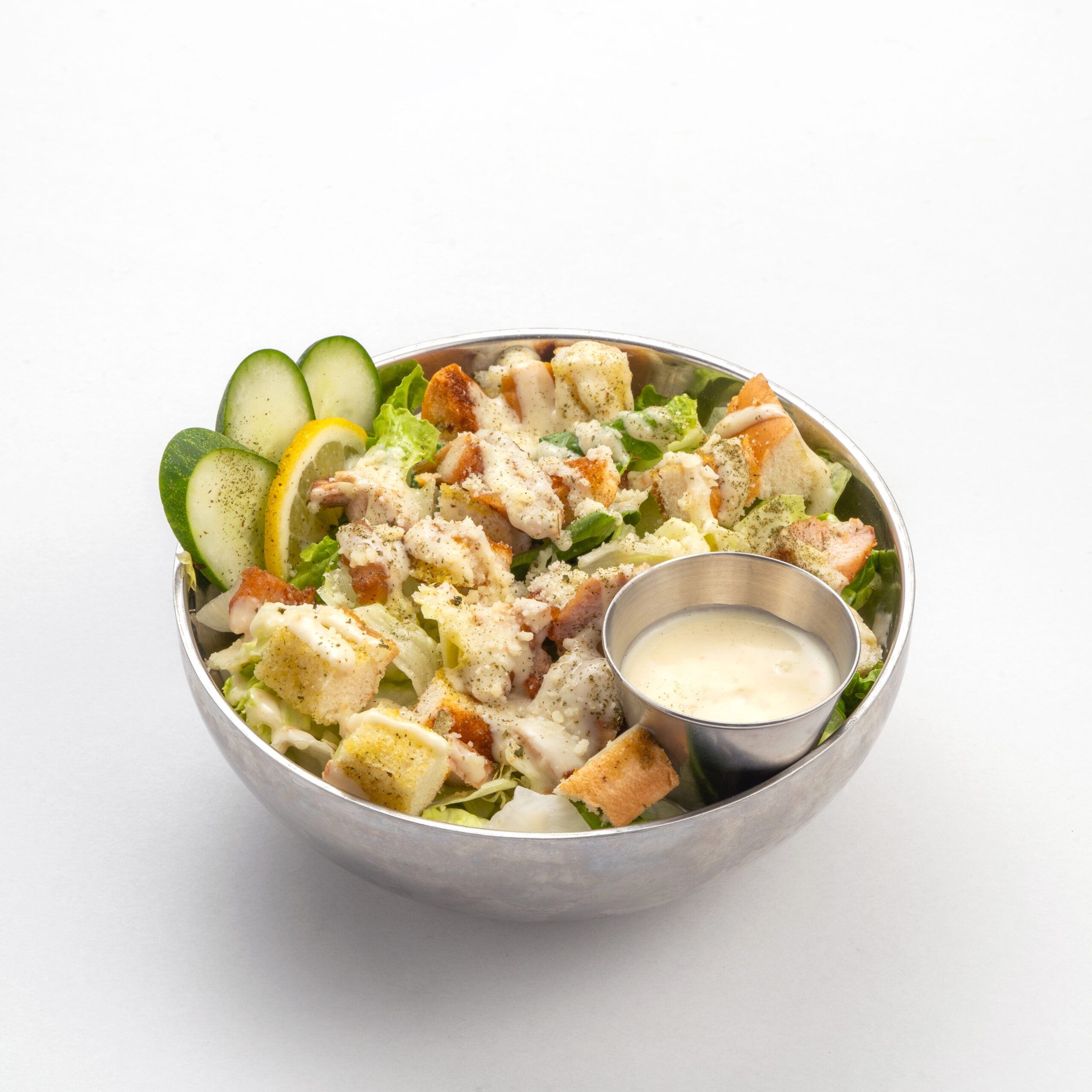 Chicken Caesar Salad in a White Background